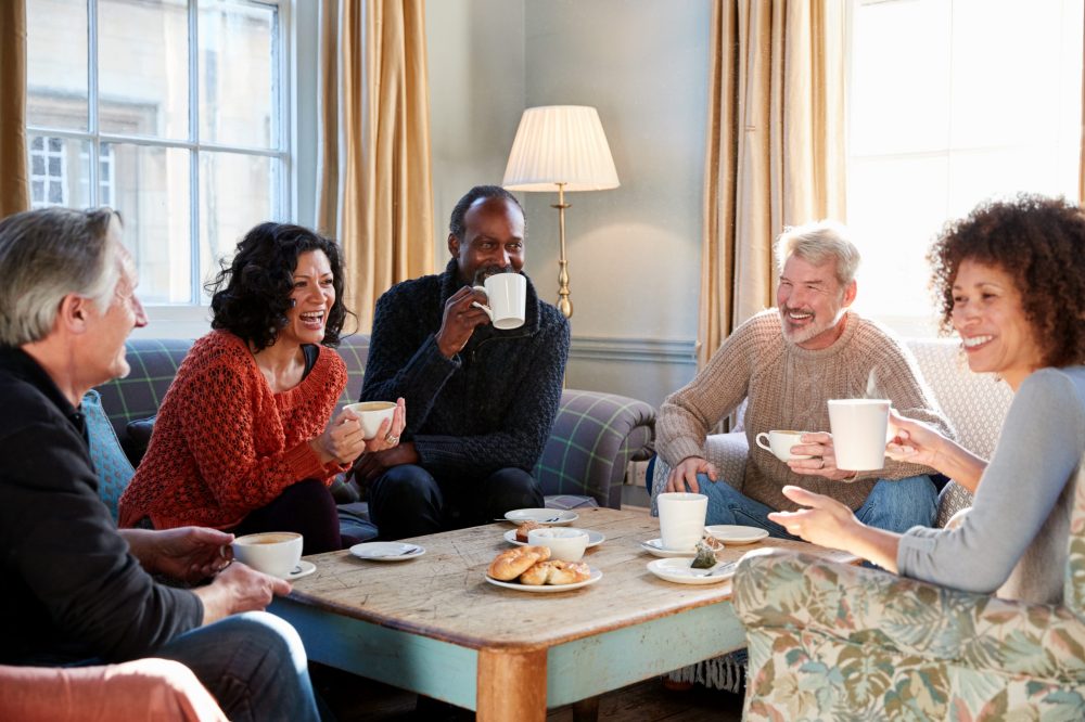 Group,Of,Middle,Aged,Friends,Meeting,Around,Table,In,Coffee Group,Of,Middle,Aged,Friends,Meeting,Around,Table,In,Coffee